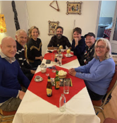 Happy guests enjoying their meal in the authentic Ethiopian restaurant setting
