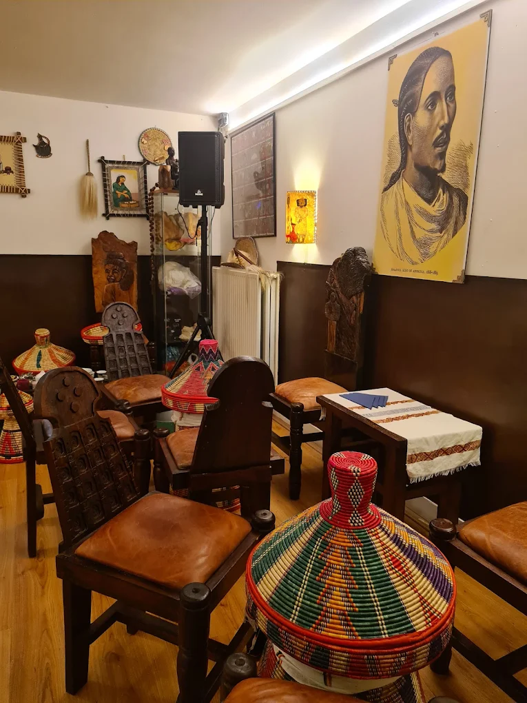 Traditional Ethiopian restaurant interior with cultural artifacts and authentic decor